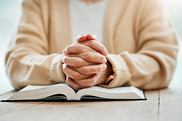 Image showing Bible, praying or hands of woman in prayer reading book for holy worship, support or hope in Christianity or faith. Jesus Christ, zoom or elderly person studying or learning God in spiritual religion