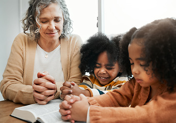 Image showing Bible, prayer or grandmother praying with kids or siblings for worship, support or hope in Christianity. Children education, family or old woman studying, reading book or learning God in religion