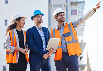 Image showing Architecture people pointing for outdoor planning, teamwork or collaboration at building construction site or development. Engineering, property and business contractor or industry person with group