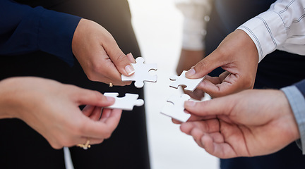 Image showing Team, hands and puzzle for teamwork, solution and integration, synergy and collaboration. Hand, business people and jigsaw for strategy, support and partnership, innovation and unity in cooperation