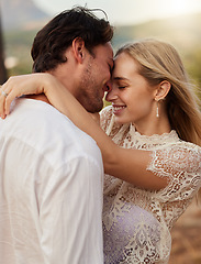 Image showing Couple, love and hug outdoor with a smile, care and romance on date in nature. Young man and woman happy together on valentines day with trust, peace and freedom or support in forest for anniversary