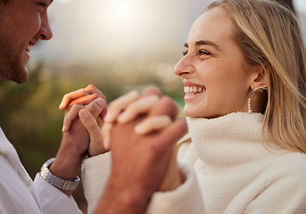 Image showing Love, couple and holding hands outdoor with a smile, care and romance on date in nature. Young man and woman happy together on valentines day with trust, peace and support in forest for anniversary