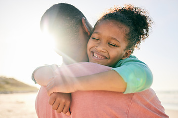 Image showing Beach, kid and happy black family hug, embrace and bond on outdoor vacation for peace, freedom and quality time. Sunshine flare, nature love and African youth child, father or people smile in Nigeria