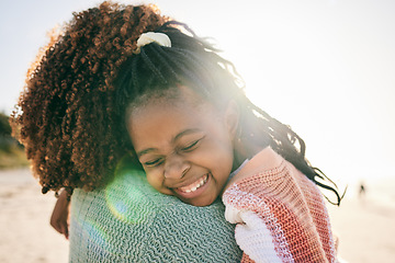 Image showing Beach, child and happy black family hug, embrace and bond on outdoor vacation for peace, freedom and quality time. Sunshine flare, nature love and African kid, mother or people smile in South Africa