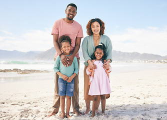 Image showing Happy portrait, nature and black family on beach holiday for peace, freedom and outdoor quality time together. Love, ocean sea sand or Jamaica children, father and mother smile with vacation sunshine