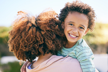 Image showing Family, woman hug kid with happiness together outdoor, face with love, support and trust. Mother, young child and happy people, portrait and care with bonding, relationship and peace with smile