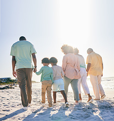 Image showing Rear view, holding hands and family at a beach for travel, vacation and holiday on summer mockup. Behind, walking and trip with children, parents and grandparents bond while traveling in Miami