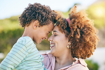 Image showing Family, happy and woman hug kid, content together outdoor and face profile with forehead touch. Mother, young child and people with eyes closed, love and care with bond, relationship and smile