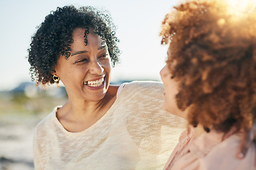 Image showing Family, mom and adult daughter hug with smile and happiness outdoor, travel and adventure on vacation. People at beach, happy women and love, care and support, relationship and freedom in the sun