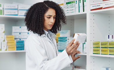 Image showing Pharmacy, medicine and retail with woman in store for healthcare, drug dispensary and treatment prescription. Medical, pills and shopping with pharmacist for check, label information or product