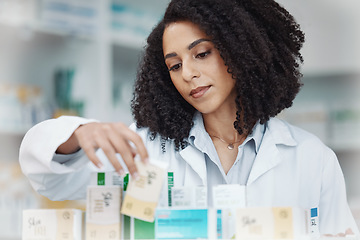 Image showing Pharmacy, medicine and pills with woman reading side effects in store for healthcare, drugs dispensary and treatment prescription. Medical, shelf and pharmacist check label information on product