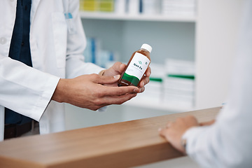 Image showing Doctor, hands and prescription medicine over the counter for consultation, healthcare or pharmaceutical product at clinic. Hand of pharmacist showing medical solution for healthy cure at pharmacy