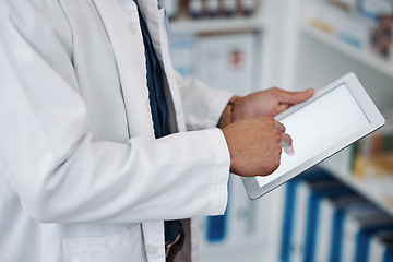 Image showing Doctor, tablet and hands on mockup screen for medical research, data or inventory check at pharmacy. Hand of healthcare expert working on touchscreen display or checking stock, medicine or Telehealth