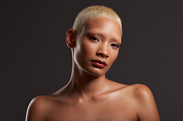 Image showing Beauty, makeup and dark portrait of black woman in studio with platinum hair isolated on grey background. Art aesthetic, cosmetics and beautiful face of African model with luxury spa facial skincare.