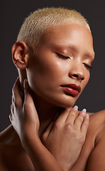 Image showing Face of black woman, dark studio and makeup, platinum hair and beauty isolated on grey background. Skincare, art aesthetic and cosmetics, and beautiful African model in skin glow and edgy spa facial.