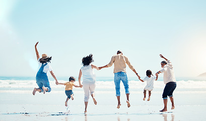 Image showing Grandparents, parents and child jump at beach for bonding, quality time and adventure together. Travel, freedom and happy big family with kids enjoy summer holiday, vacation and relax on weekend