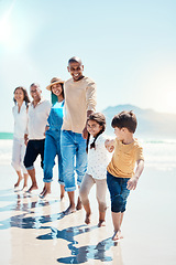 Image showing Walking, portrait and a big family holding hands at the beach for a walk, bonding and playing. Love, carefree and children at the sea with grandparents and parents on a holiday in Spain together