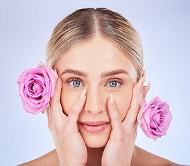 Image showing Beauty, manicure and rose with portrait of woman for self care, natural cosmetics and glow. Spring, spa and facial treatment with girl model and flowers for blossom, organic and plants in studio