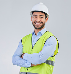 Image showing Construction worker, engineer and studio portrait of happy man in vest and helmet for safety on white background. Smile, contractor or architect in planning or renovation, project manager in India.