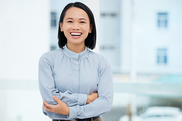 Image showing Asian, business woman and arms crossed, smile in portrait and professional mindset with positivity and success. Mockup space, corporate female and happy in career, ambition and empowerment with pride