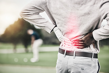 Image showing Sports, injury and golf, black man with back pain during game on course, massage and relief in health and wellness. Green, hands on spine for support and golfer with body ache during golfing workout.