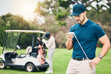 Image showing Golf, sports and man on course with golfing club ready to start game, practice and training for competition. Professional golfer, activity and male caddy on grass for exercise, fitness and recreation