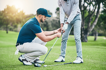 Image showing Golf lesson, teaching and sports coach help man with swing, putt and stroke outdoor. Lens flare, green course and club support of a athlete ready for exercise, fitness and training for a game