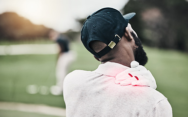 Image showing Sports, injury and golf course, black man with shoulder pain during game, massage and relief in health and wellness. Green, hands on muscle in support and golfer with body ache during golfing workout