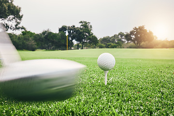 Image showing Sports, golf ball and swing with club on course for training, tournament and games. Match, competition and shot with equipment on lawn field and playing for hobby, recreational and leisure in outdoor