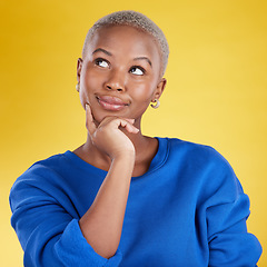 Image showing Thinking, solution and face of black woman in studio, yellow background and backdrop. Female model brainstorming decision, ideas and question of planning, choice and inspiration of memory for mindset