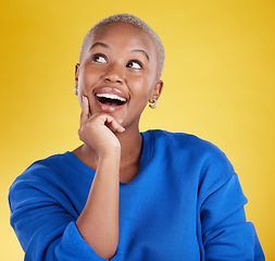 Image showing Wow, thinking and aha with a black woman in studio on a yellow background looking thoughtful or surprised. Idea, wonder and eureka with an attractive young female feeling shocked or contemplative