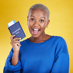 Image showing Passport, excited and woman face isolated on yellow background for USA travel opportunity, immigration or holiday. Identity documents, flight ticket and wow portrait of young black person in studio