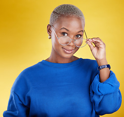 Image showing Face, black woman and glasses for vision, fashion and casual outfit against a studio background. Portrait, African American female and lady with spectacles, eyewear and clear sight with confidence