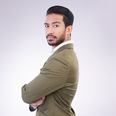 Image showing Business man, serious and portrait with arms crossed in studio with pride for career on gray background. Asian male entrepreneur with dedication and ambition for professional occupation mockup space