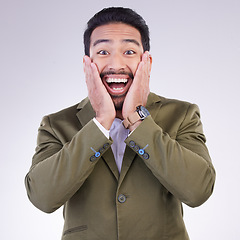 Image showing Happy, surprise and portrait of a businessman in a studio with wow, omg or wtf face expression. Happiness, excited and corporate male model from India with a shock facial gesture by a gray background