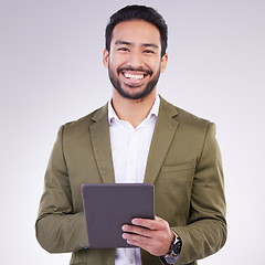 Image showing Business man, tablet and smile portrait in studio for internet, communication and network connection. Entrepreneur male online for mobile app networking, marketing or research on investment or sales