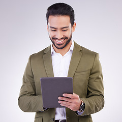 Image showing Business man, tablet and smile in studio for internet, communication and network connection. Entrepreneur male online for mobile app networking, social media or research on investment or sales