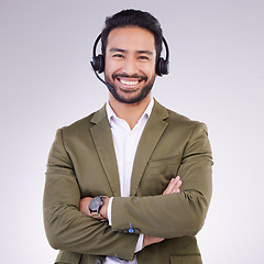 Image showing Call center employee, man with smile and arms crossed in portrait, headset with mic, CRM and contact us. Communication, customer service or tech support mockup with happy male on studio background