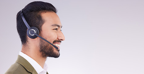 Image showing Call center, man and face profile with smile, headset and mic, CRM and contact us with mockup space. Communication, customer service or tech support, telemarketing and happy male on studio background