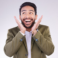 Image showing Happy, excited and young businessman in a studio with wow, omg or wtf face expression. Happiness, surprise and corporate male model from India with a shock or amazed facial gesture by gray background