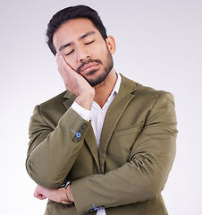 Image showing Tired, bored and Asian man sleeping for rest isolated on a white background in a studio. Dream, young and a Japanese businessman with fatigue, exhausted and sleep for stress relief on a backdrop