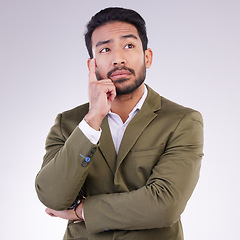 Image showing Business man, thinking and planning in studio with ideas or strategy on gray background. Asian male entrepreneur think with hand and arms crossed pensive or contemplating question, thought or mission