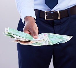 Image showing Promotion, money and hands of black man in studio for winner, investment and wealthy. Success, payment and profit with male holding cash isolated on white background for cashback, salary and rich