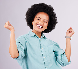 Image showing Happy, smile and portrait of black woman in studio for celebration, surprise and confidence. Winner, happiness and good news with female isolated on gray background for cheerful, yes and excited