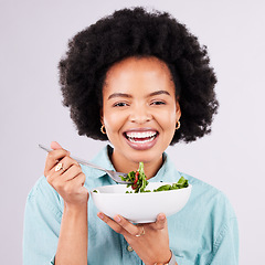 Image showing Health, salad and portrait of a black woman in studio eating vegetables for nutrition or vegan diet. Happy African female with a smile for healthy food, detox and wellness benefits for motivation