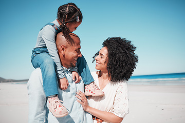 Image showing Happy, love and family at the beach while on a vacation, adventure or summer weekend trip. Happiness, smile and girl child by the ocean with her parents while on a tropical seaside holiday in Mexico.