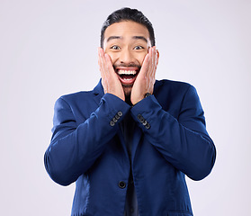 Image showing Surprise, excited and portrait of man in studio with omg, happiness and good news on white background. Winner, wow mockup and isolated happy male with hands on face for winning, smile and success