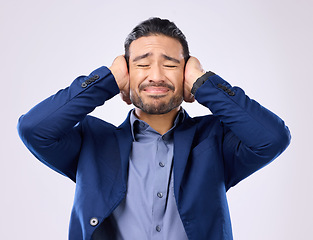 Image showing Employee, noise and Asian man cover ears, stress and mental health against a grey studio background. Japan, male and guy with hands on temples, loud and depression with frustration, audio and sound