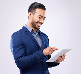 Image showing Man, business and tablet with a smile in studio for communication and network connection. Asian male model isolated on a gray background with tech for mobile app, online chat and search on internet