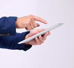 Image showing Tablet, hands and man online in studio for communication with network connection on social media. Business male typing an internet search, mobile app and email chat with contact on white background